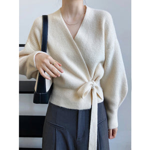 Handmade French retro knitted women's cardigan sweater with V-neck and tie detail, loose fit, in soft yarn.