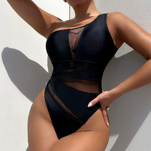 Women's black one-piece swimsuit from Hot Trend Vault featuring a sleek, solid color design ideal for swimming and beachwear.
