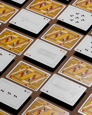 Midway Gardens commemorative playing cards by Frank Lloyd Wright, featuring intricate designs, laid out in a grid pattern.