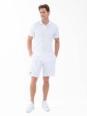 Men's white performance tennis polo with rib collar, classic fit, from Hot Trend Vault, shown on a male model.