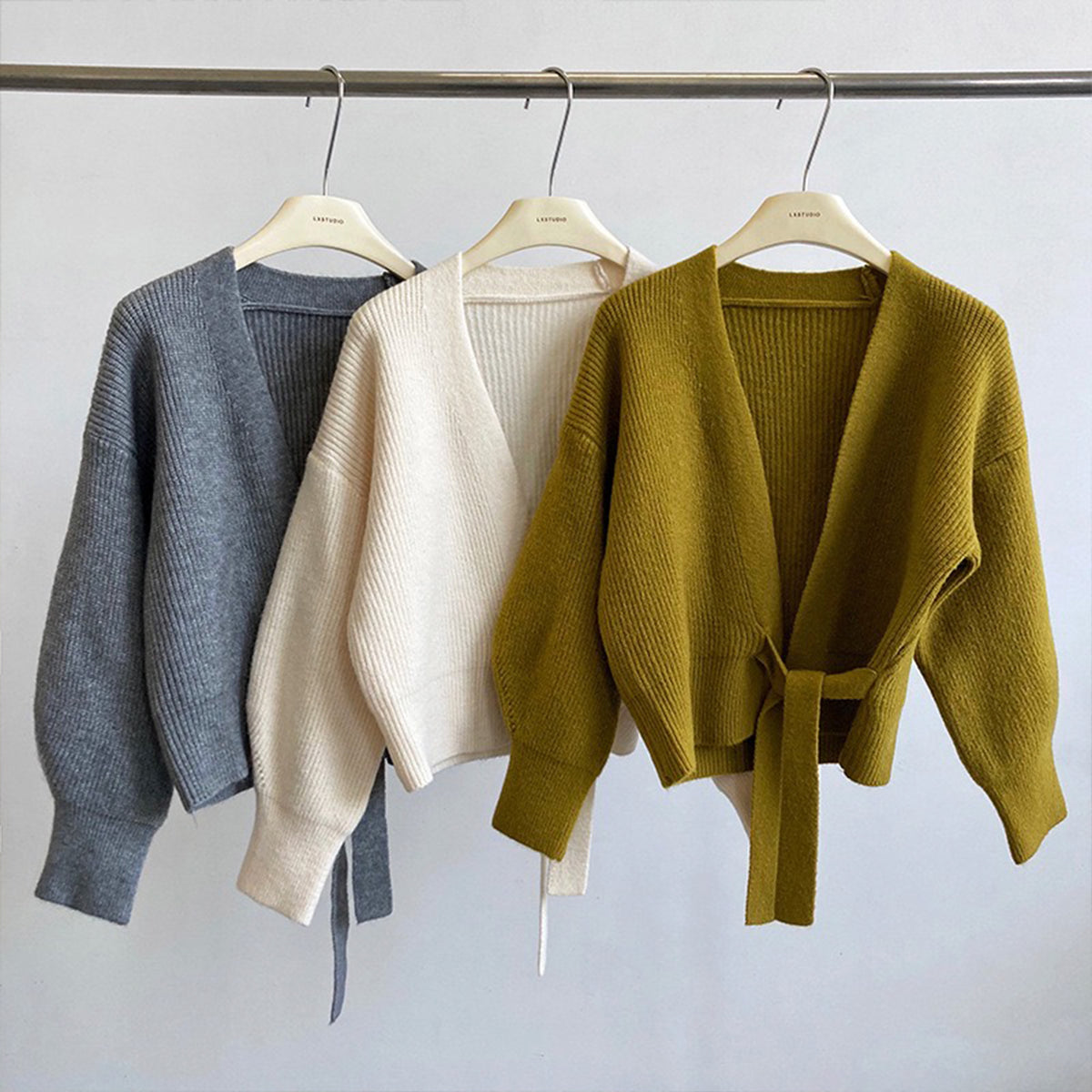 Handmade French retro knitted women's cardigan sweater with V-neck and tie, loose fit, in soft yarn, by Hot Trend Vault.