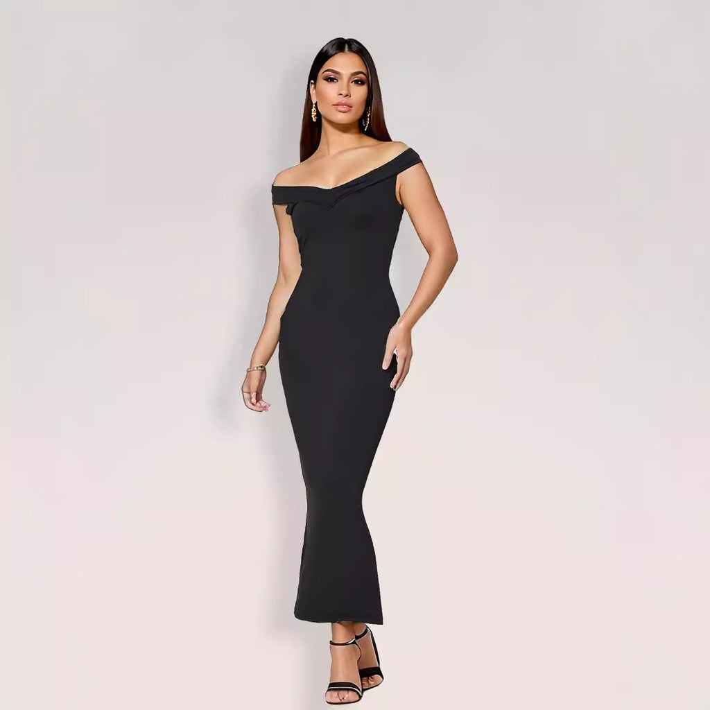 Black women's summer off-shoulder maxi dress with pleated strapless design and sleeveless polyester fabric by Hot Trend Vault.
