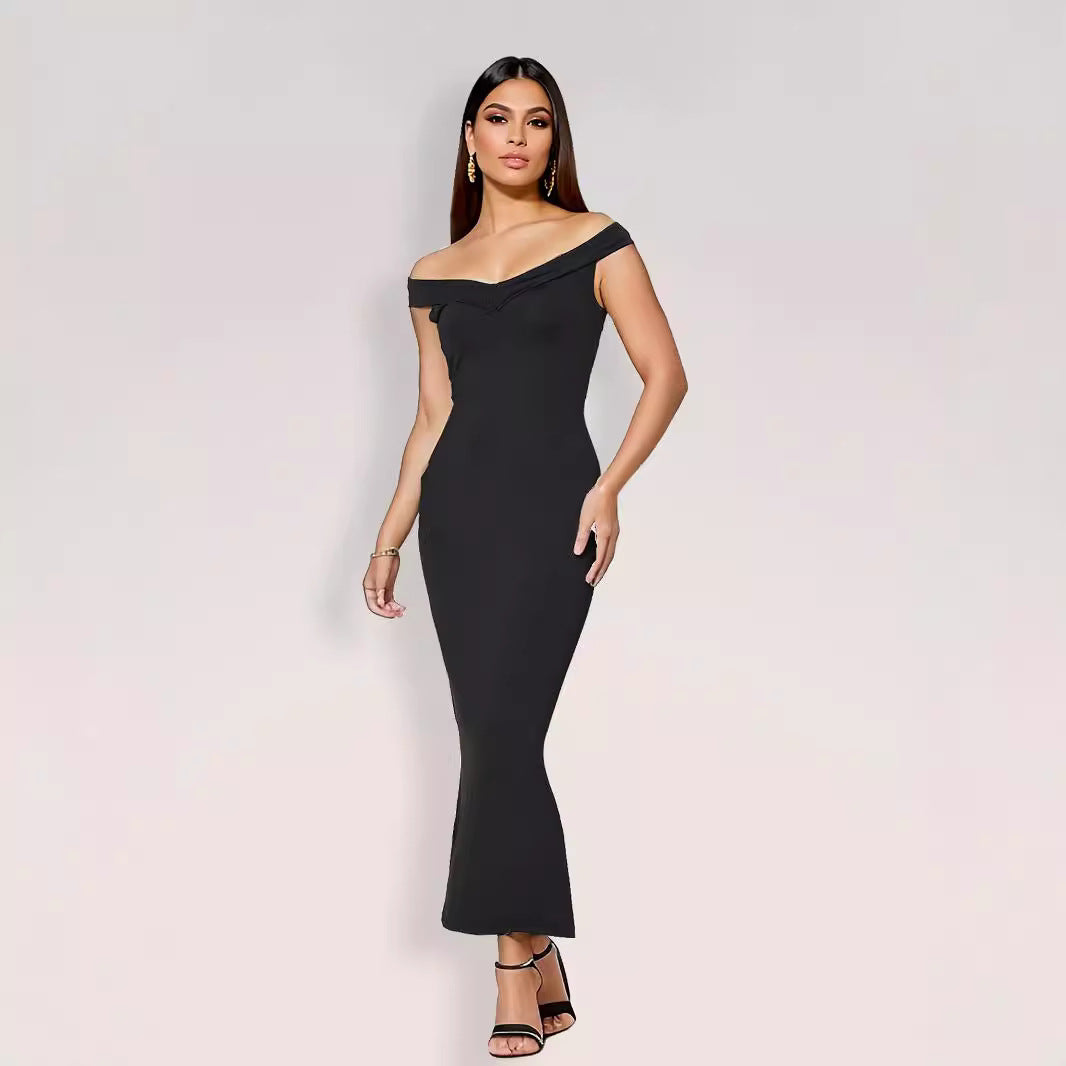 Black women's summer off-shoulder maxi dress with pleated strapless design and sleeveless polyester fabric by Hot Trend Vault.