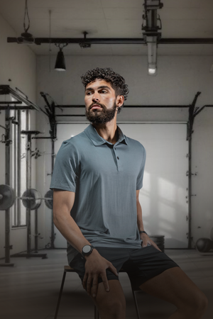 Men's Ash Gray Terra Recovery Polo by Hot Trend Vault, showcasing everyday comfort and stylish fit in a close-up image.