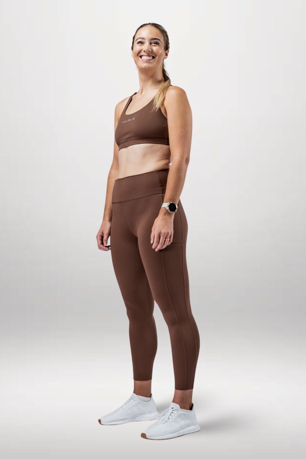Women's Soho full-length high waist leggings in city mocha by Varlo, shown on a model with a form-fitting style.