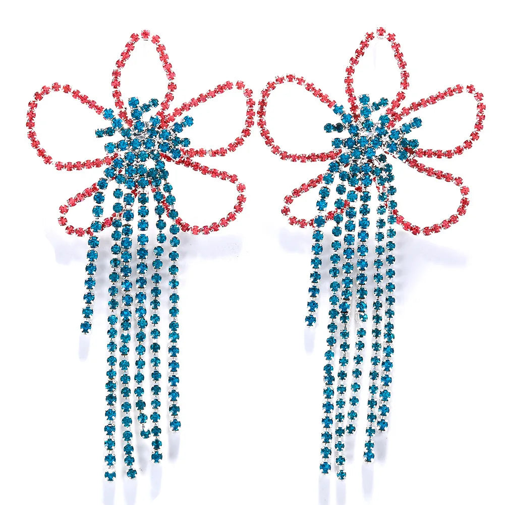 Colorful tassel flower earrings by Hot Trend Vault featuring vibrant, festival-ready drop jewelry for drag queen fashion.