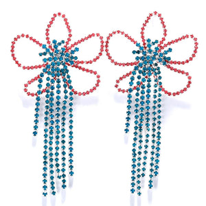 Colorful tassel flower earrings by Hot Trend Vault featuring vibrant, festival-ready drop jewelry for drag queen fashion.