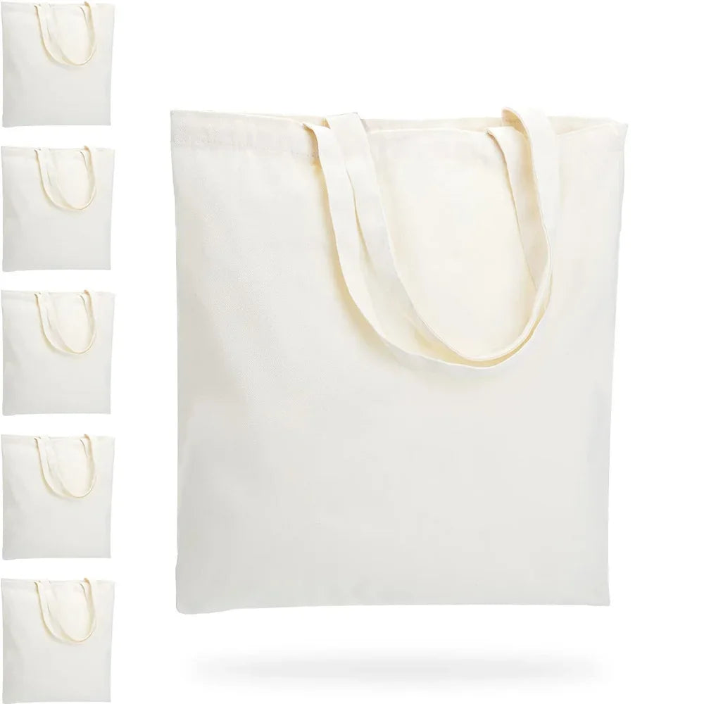 Six durable canvas tote bags from Hot Trend Vault, reusable eco-friendly grocery bags for eco-conscious shoppers.