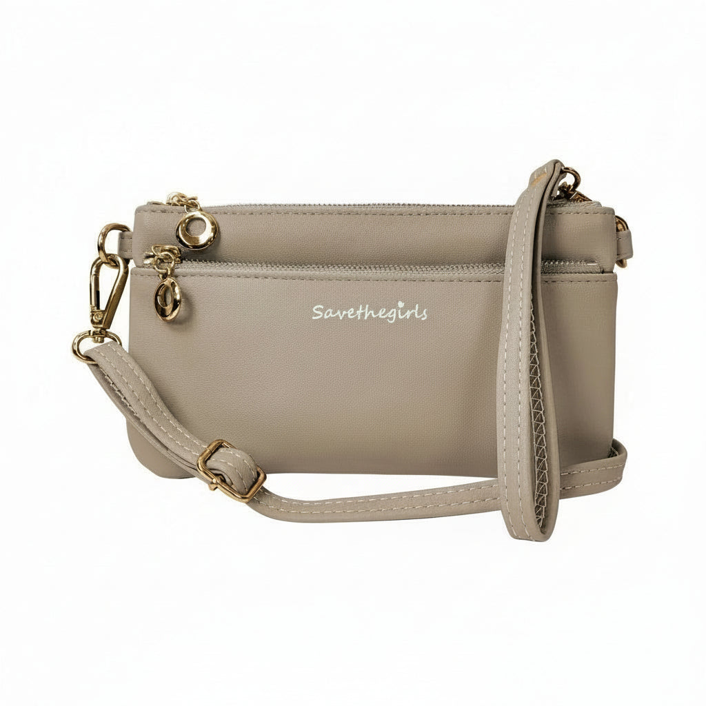 Hot Trend Vault Bella RFID crossbody purse with smartphone access and RFID blocking, featuring a sleek, compact design.