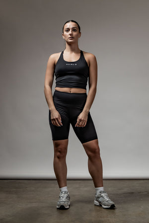 Black SOHO Women's Technical High Rise Shorts with 8-inch inseam, featuring sleek fabric and modern fit, by Hot Trend Vault.