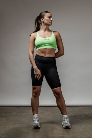Black SOHO women's technical high rise shorts with 8-inch inseam, featuring a sleek, fitted design for active wear.