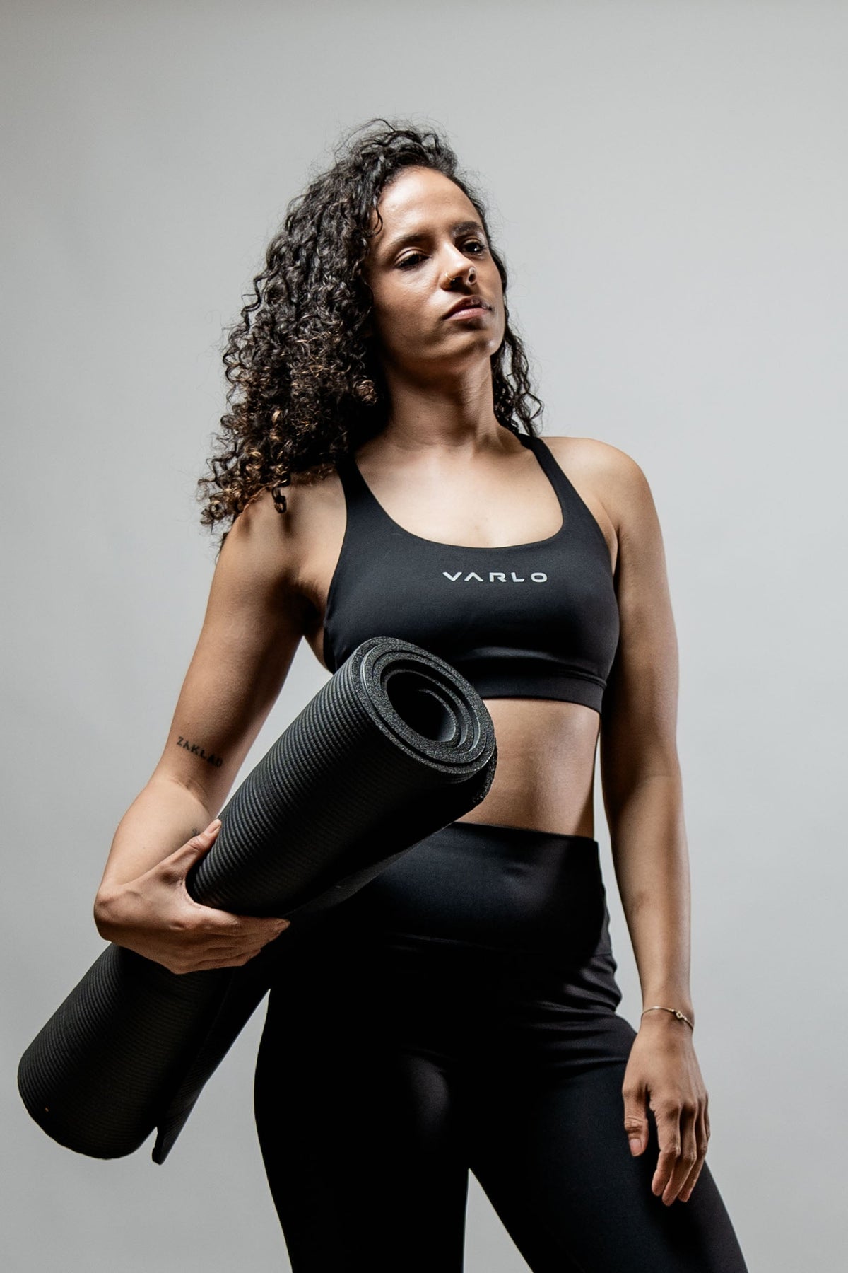 Black SOHO Cross Back Sports Bra for women by Hot Trend Vault, featuring breathable fabric and supportive design for active wear.