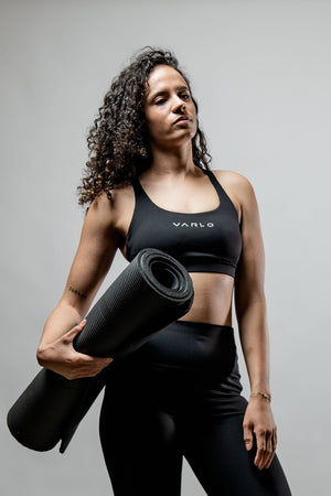 Black SOHO Cross Back Sports Bra for women by Hot Trend Vault, featuring breathable fabric and supportive design for active wear.