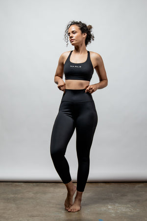 Black women's Soho high waist leggings by Hot Trend Vault, full-length stretch leggings for a sleek and comfortable fit.