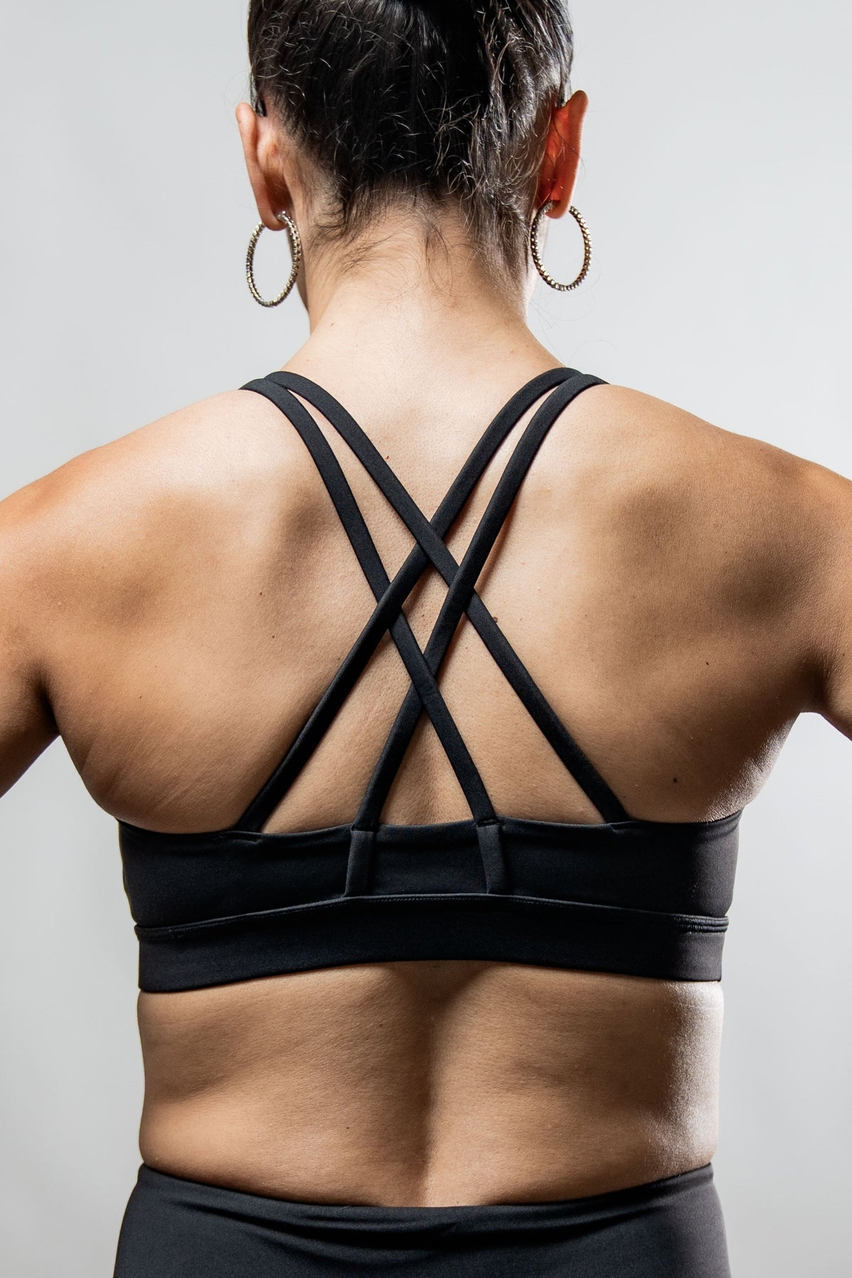 Black SOHO Cross Back Sports Bra for women by Hot Trend Vault, breathable, supportive athletic wear with cross-back design.
