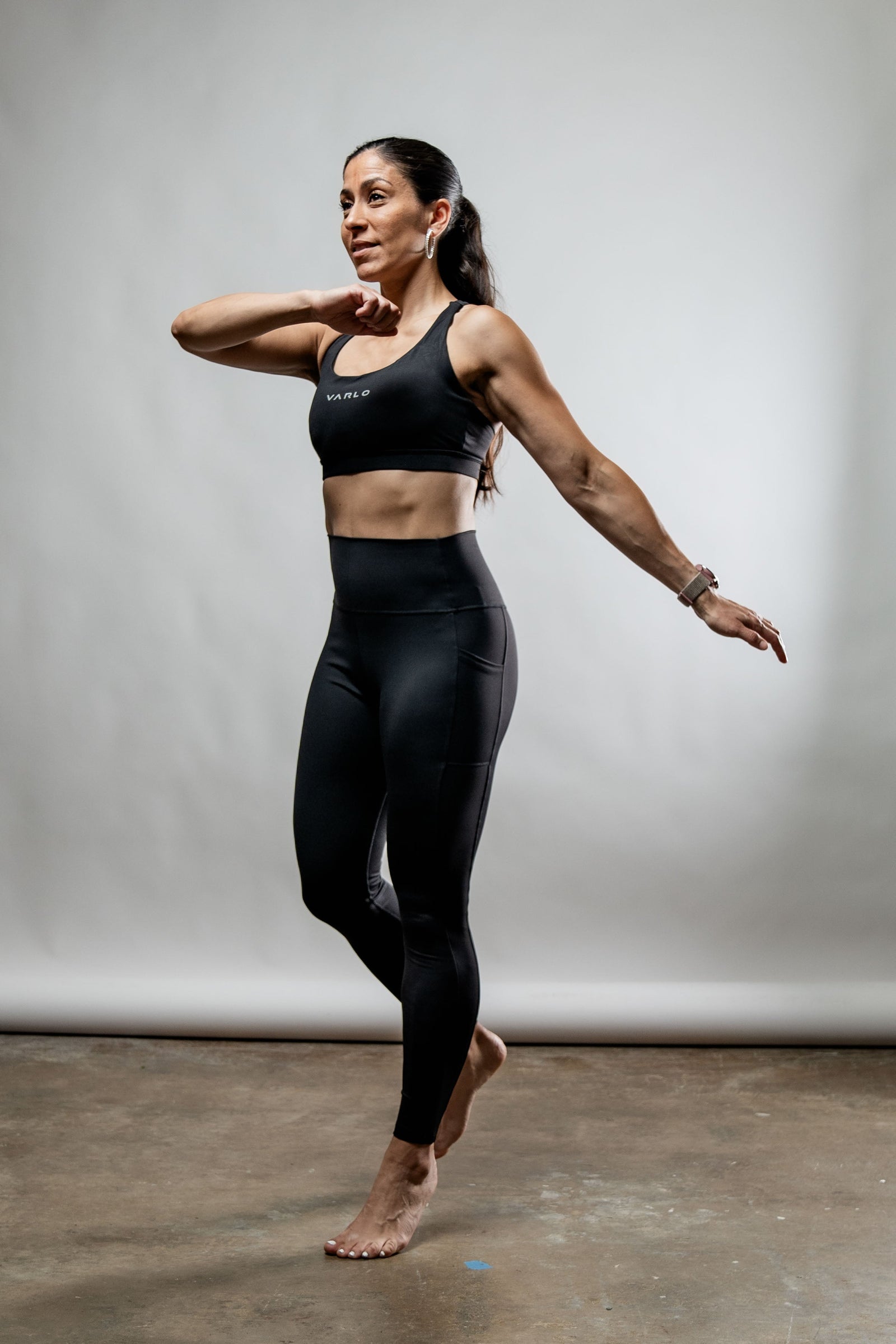 Black women's Soho full-length high waist leggings by Hot Trend Vault, showing a close-up of the fitted, stretchy fabric.