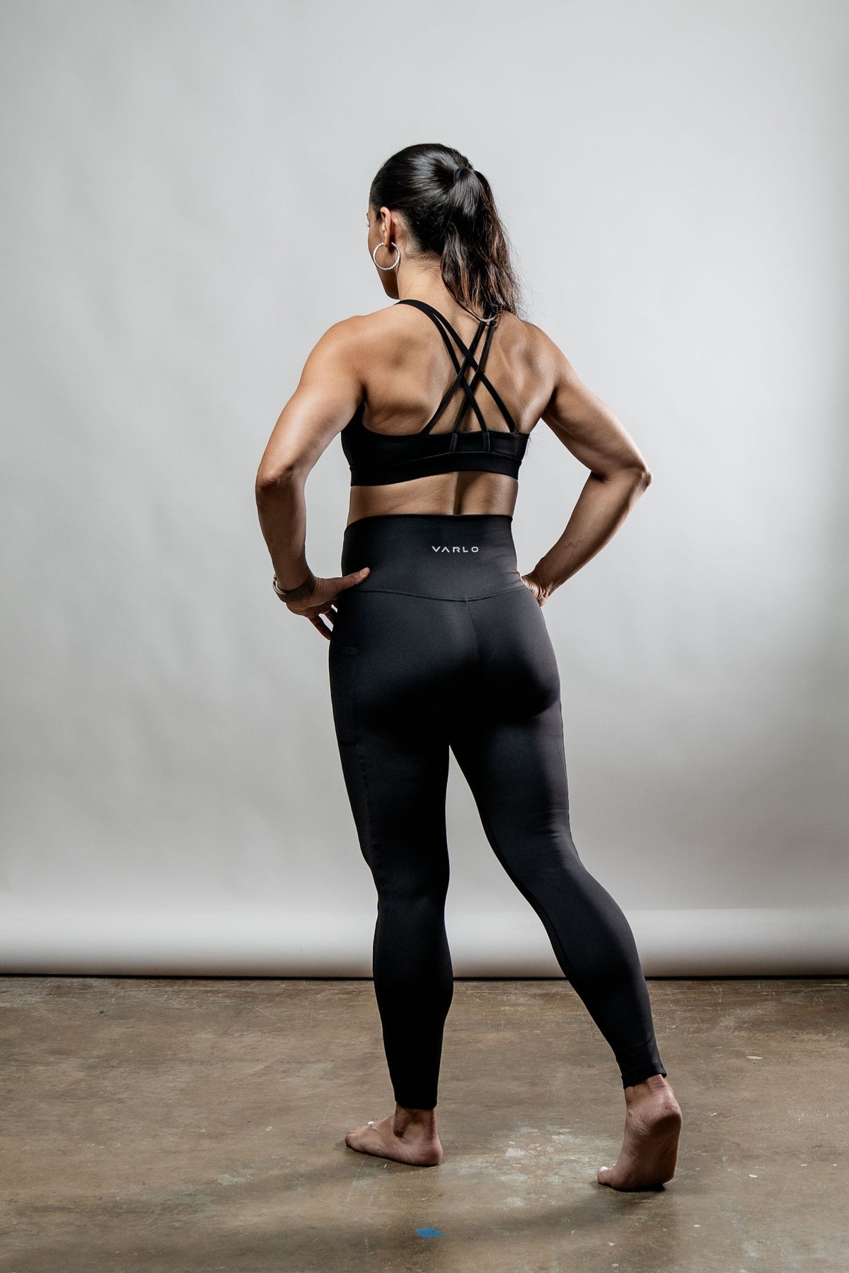 Women's black Soho high waist leggings by Hot Trend Vault, full length and form-fitting, shown on a model.
