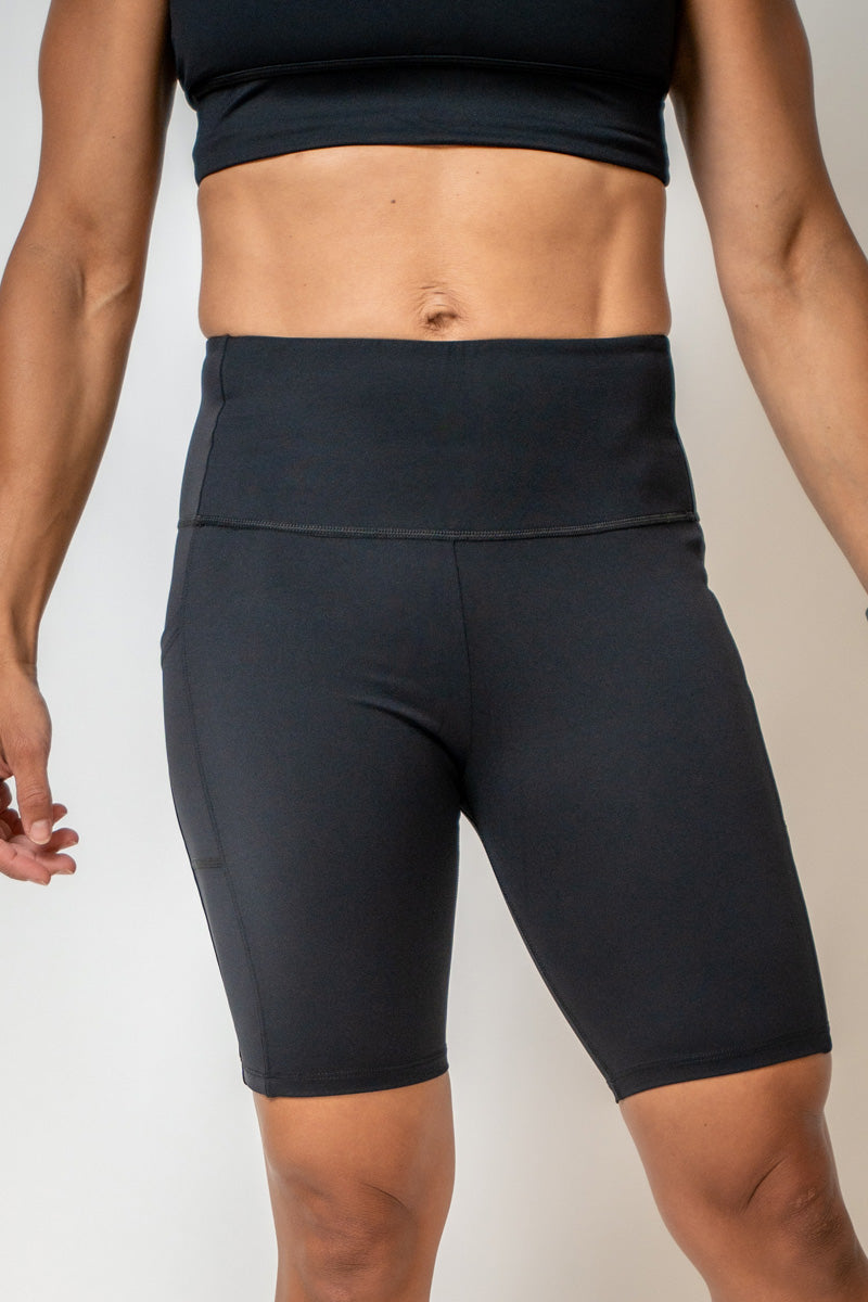 Black SOHO womens technical high rise shorts with 8-inch inseam, designed for active wear by Hot Trend Vault.
