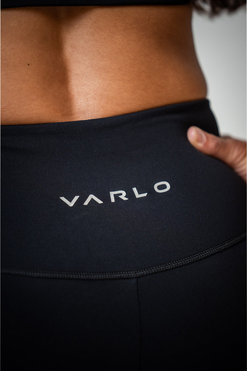 Black SOHO Women's Technical High Rise Shorts with 8-inch inseam, featuring a sleek design and comfortable fit.