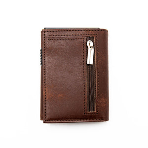 Full-grain vegetable tanned leather wallet with RFID blocking and popup card holder by Hot Trend Vault.