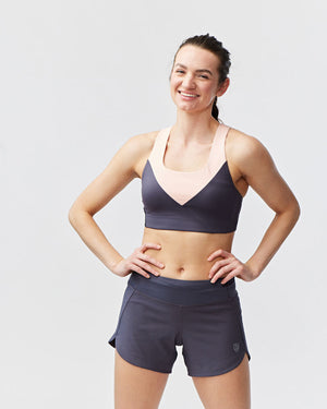 Excel Women's Workout Shorts from Hot Trend Vault in carbon color, designed for extra coverage during sprints and training.