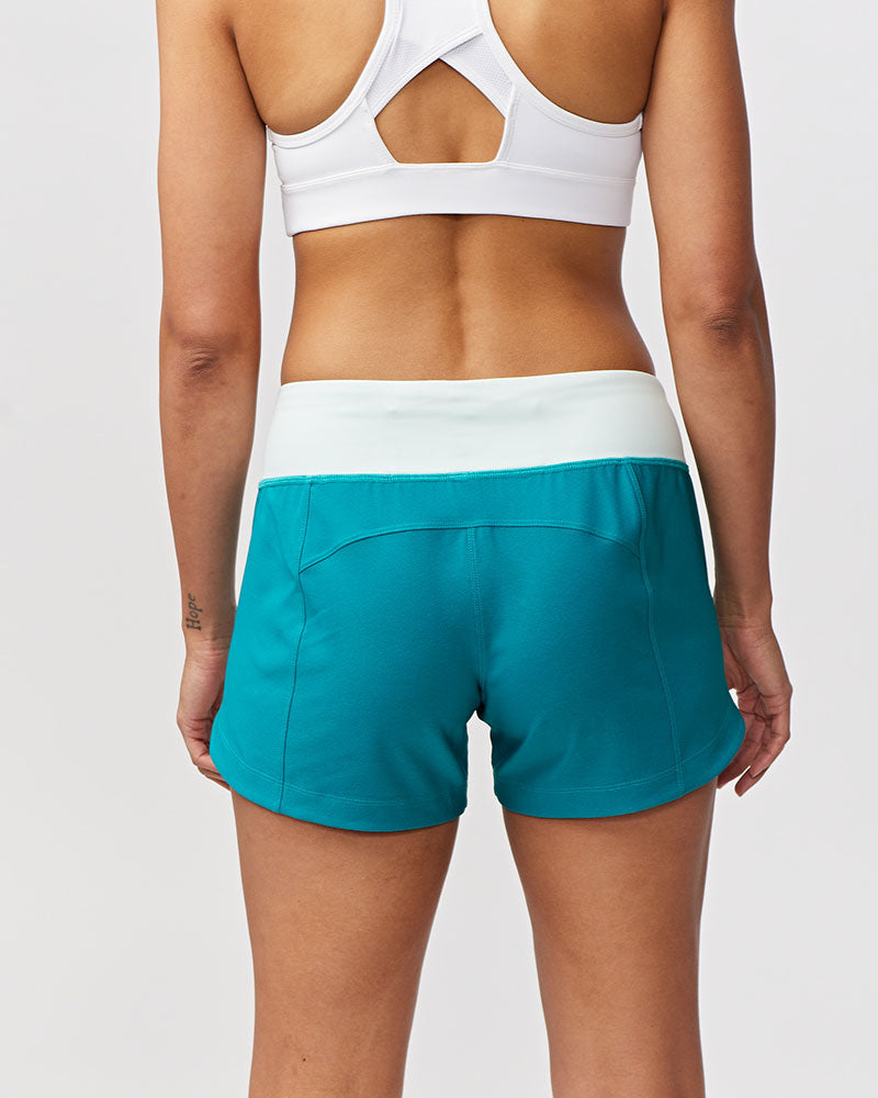 Excel women's workout shorts by Hot Trend Vault featuring extra coverage, in malachite and skylight colors for active training.