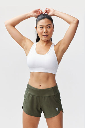 Dark moss green Excel women's workout shorts by Hot Trend Vault, designed for extra coverage during sprints and exercise.