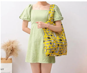 Hot Trend Vault eTyaC reusable foldable shopping bag for women, large, eco-friendly tote, heavy-duty, washable, foldable design.