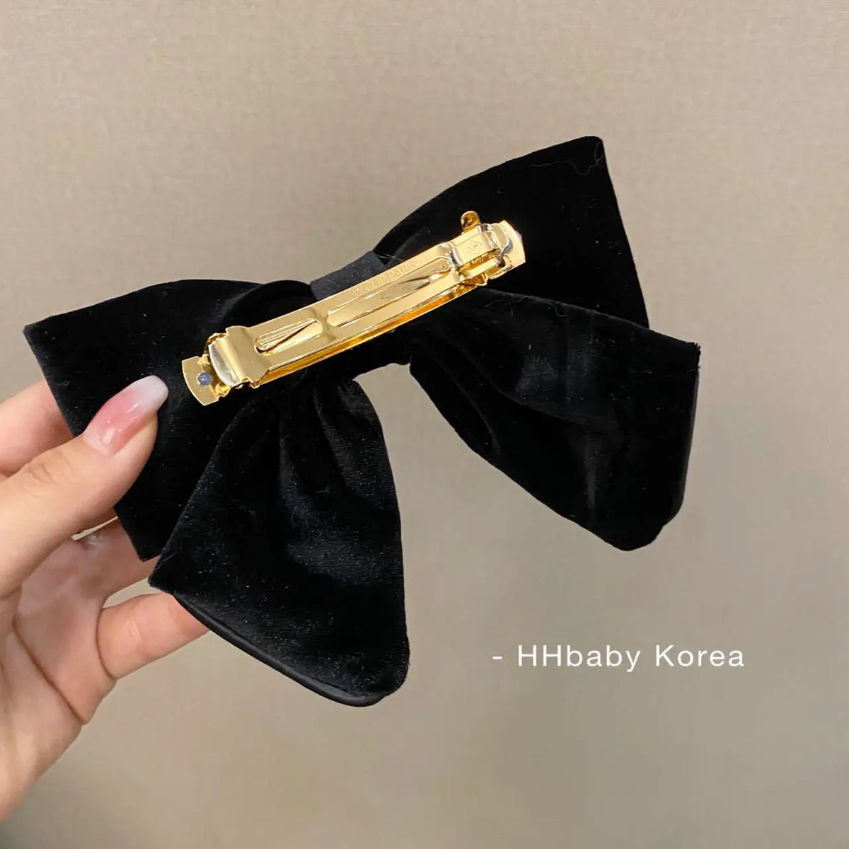 Velvet hair clips with three-dimensional bowknot design for women and girls, elegant accessory by Hot Trend Vault.