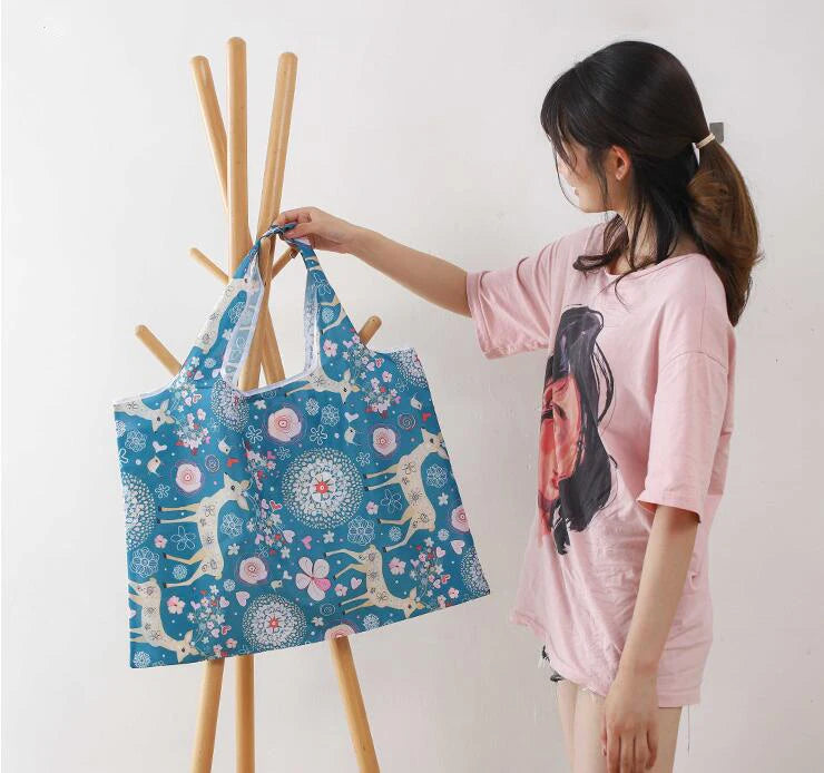Reusable foldable shopping bag by Hot Trend Vault, large eco-friendly tote with washable, heavy-duty design for women.