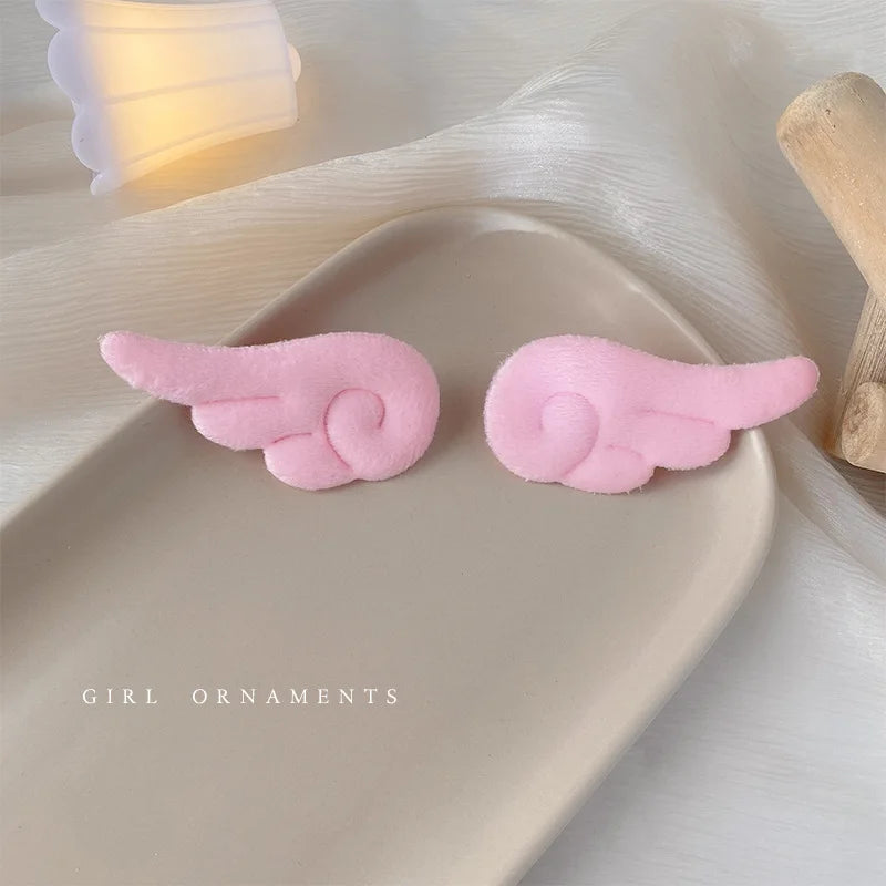 Cute plush hair clips from Hot Trend Vault, 2-pack, featuring colorful, soft fabric designs for girls and kids.
