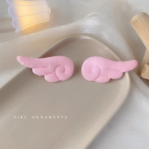 Cute plush hair clips from Hot Trend Vault, 2-pack, featuring colorful, soft fabric designs for girls and kids.