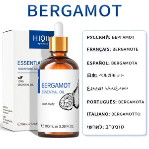 Hot Trend Vault HIQILI Essential Oil Blend 100ml calming diffuser with spa fans, showcasing the product bottle and diffuser setup.