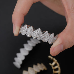 Iced Out CZ grillz set for men and women, top and bottom, 14K gold plated, featuring sparkling cubic zirconia stones.