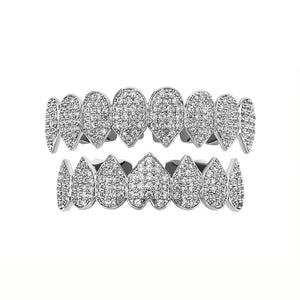 Iced Out CZ teeth grillz set for men and women, 14K gold plated top and bottom dental jewelry by Hot Trend Vault