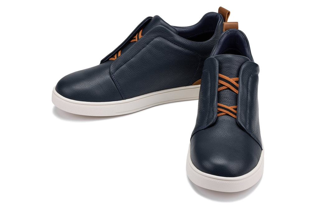 Navy slip-on casual loafers by Hot Trend Vault with a 2.6-inch height boost and comfortable design, shown from a side angle.