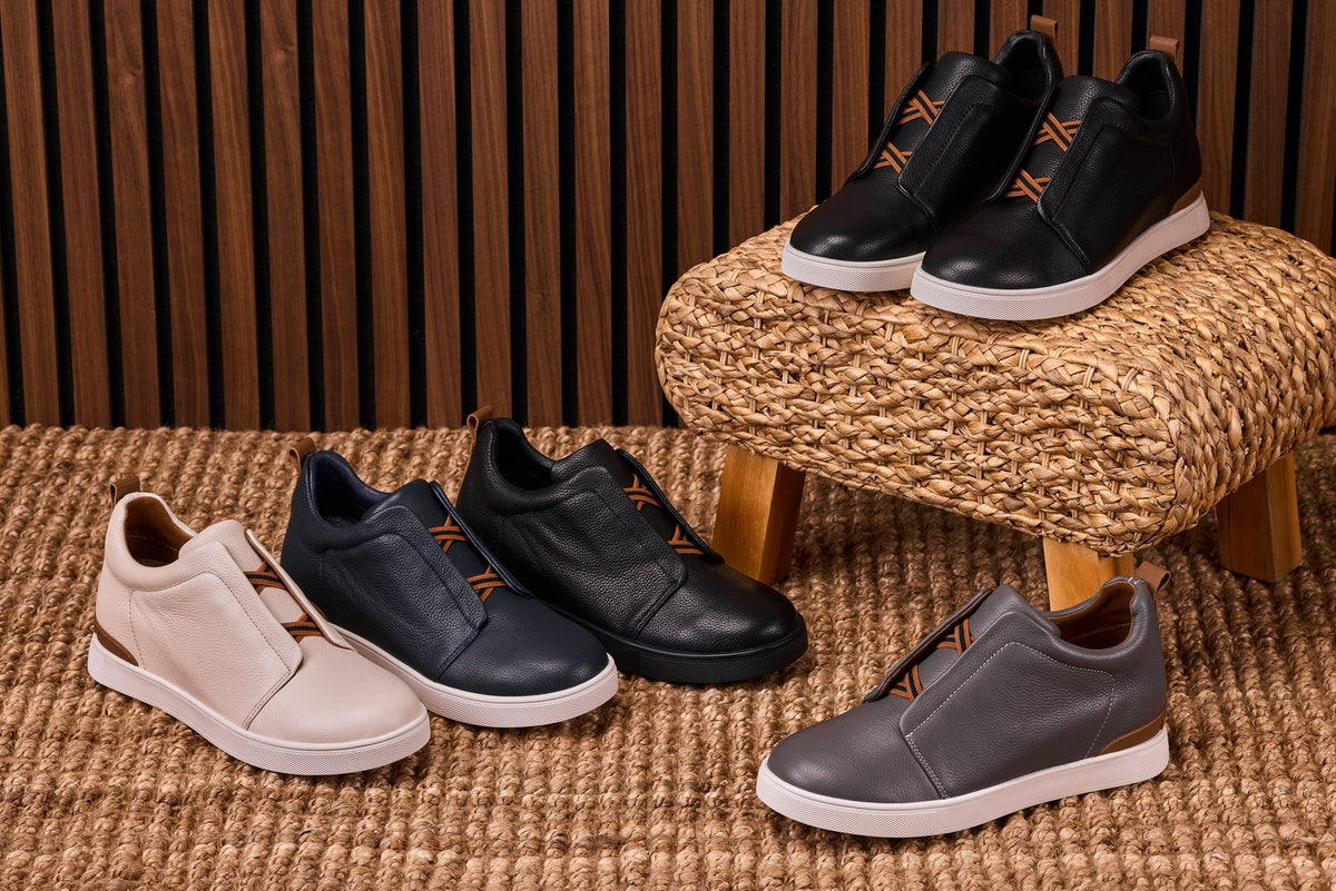 Hot Trend Vault navy slip-on sneakers with 2.6-inch height boost, casual comfort, stylish design, and easy-to-wear slip-on style.