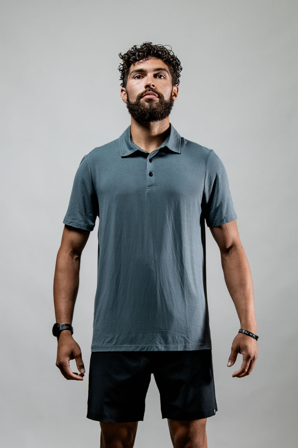 Men's Ash Gray Terra Recovery Polo by Hot Trend Vault, featuring comfortable fit and casual style, shown on a model.