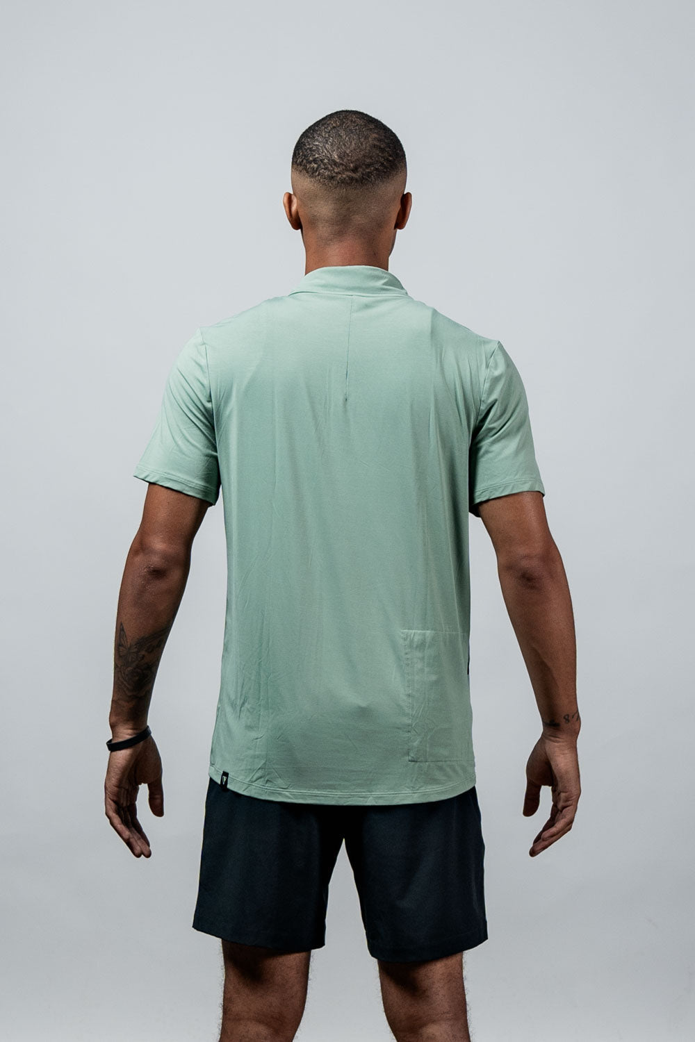 Men's Terra Recovery Polo by Hot Trend Vault in low light olive, showing the polo shirt with a classic collar and short sleeves.