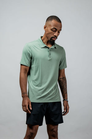 Men's Terra Recovery Polo in low light olive by Hot Trend Vault, featuring a classic polo shirt design with a comfortable fit.