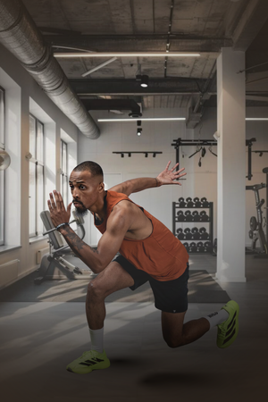 Men's Terra Recovery Tank Top by Hot Trend Vault in Sunfire Clay, designed for everyday movement and recovery, shown on a model.