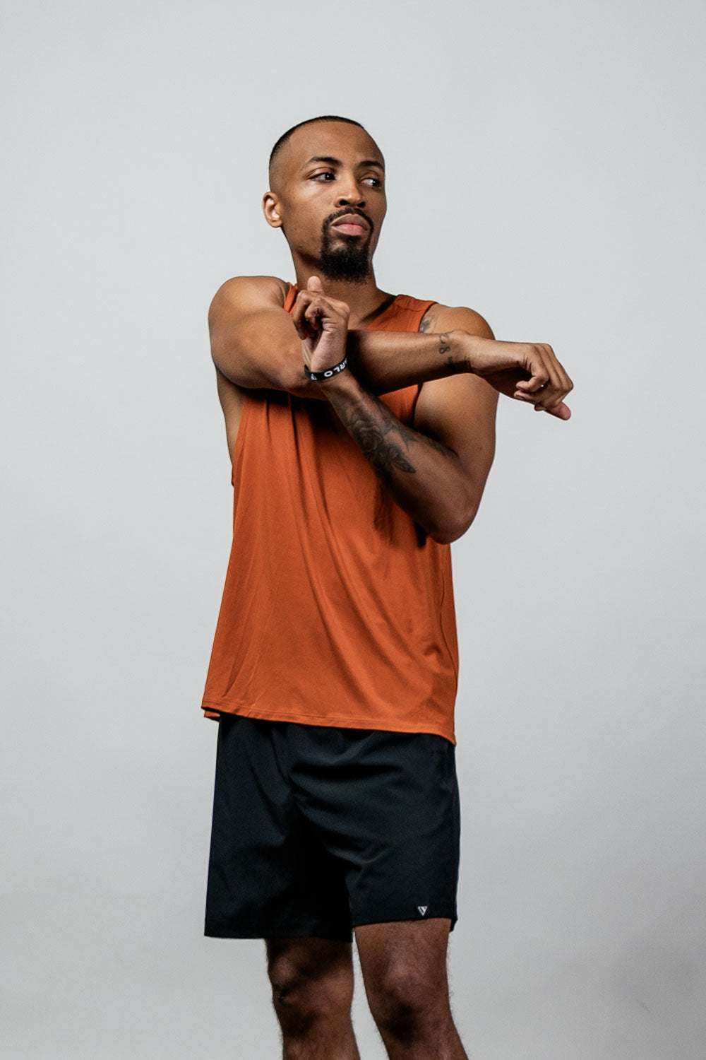 Men's Terra Recovery Tank Top in Sunfire Clay by Hot Trend Vault, featuring a comfortable fit for everyday movement and recovery.