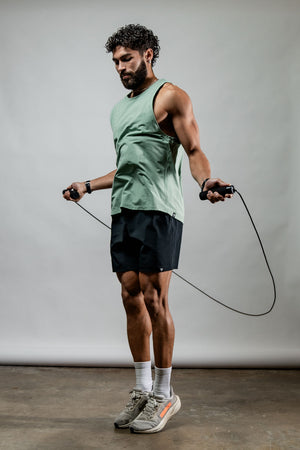 Men's olive green Terra Recovery Tank top by Hot Trend Vault, low-light casual design for everyday movement and comfort.
