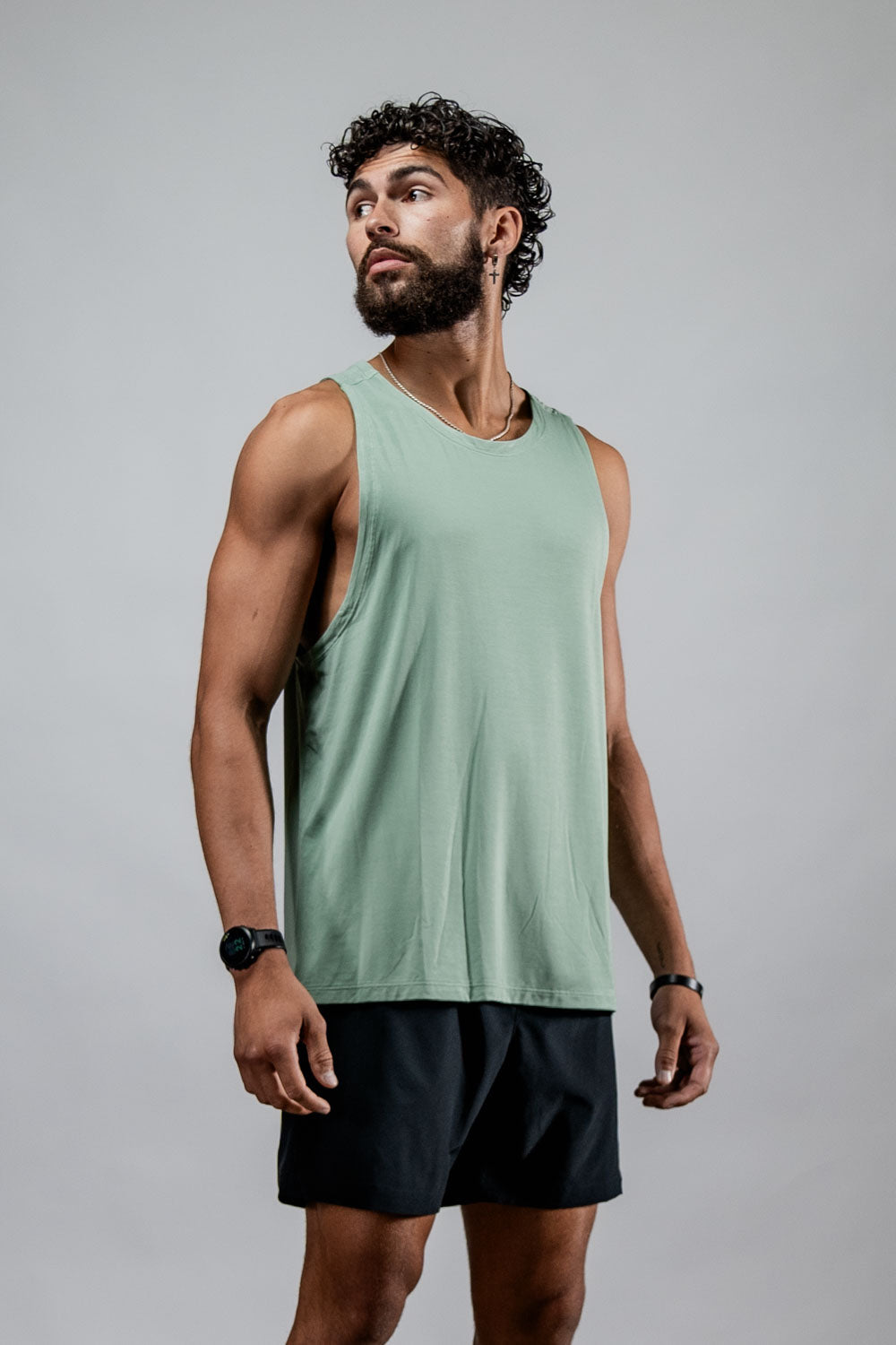 Men's olive green Terra Recovery Tank Top by Hot Trend Vault, featuring a low light design for everyday movement and active wear.