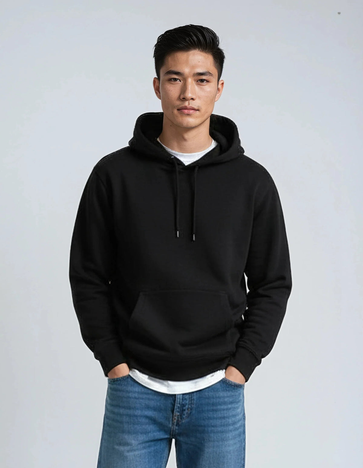 Black heavyweight fleece pullover hoodie by SpectraUSA, made from 10 oz cotton-polyester blend, shown in front view.