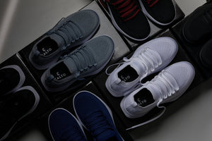 Hot Trend Vault CALTO QA063 navy knitted sneakers with white sole and 2.4-inch lift, ideal for casual athletic wear.