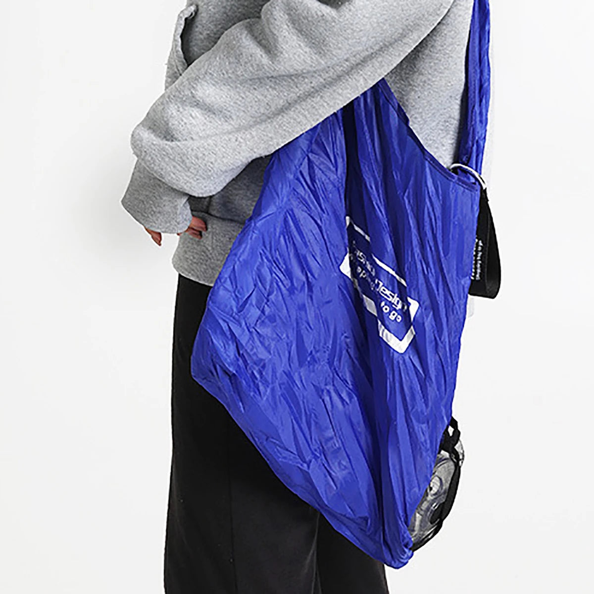 Hot Trend Vault Oein reusable foldable shopping bag with large capacity, eco-friendly design, shown in a compact, foldable form.