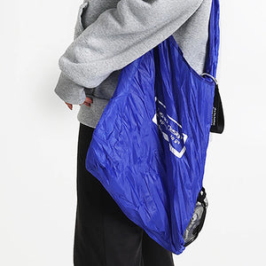 Hot Trend Vault Oein reusable foldable shopping bag with large capacity, eco-friendly design, shown in a compact, foldable form.