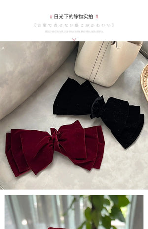 Velvet oversize bow hair clip for women and girls by Hot Trend Vault, featuring a stylish and elegant design.