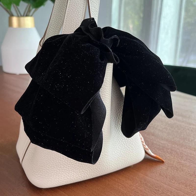 Velvet oversize bow hair clip for women and girls, stylish accessory from Hot Trend Vault, featuring soft fabric and elegant design.